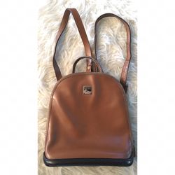 Vintage parasole camel brown Dooney and Bourke leather backpack shows signs of minor wear still in great condition 10"X3.5"X11"