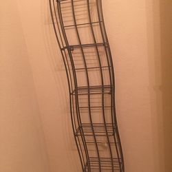 Folding metal shelf