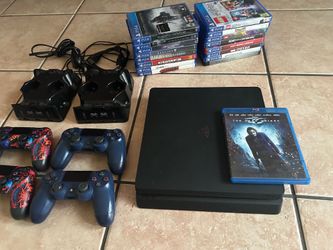 PS4 with controllers and games