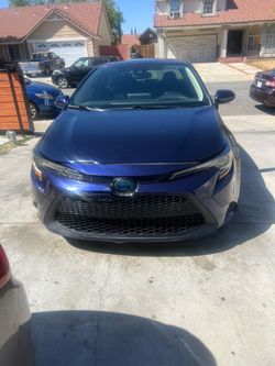 TOYOTA COROLLA HYBRID 2020 SALVAGE 114,300 MILLAS