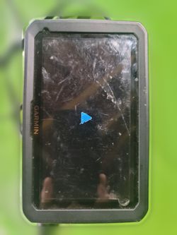 Garmin dezl 7 inch GPS truck navigator - powers on, screen protector still on