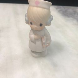 Precious Moments “1994” Small Nurse. 