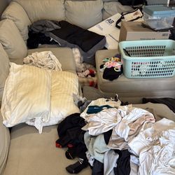 Sectional plus ottoman minus the clothes :)