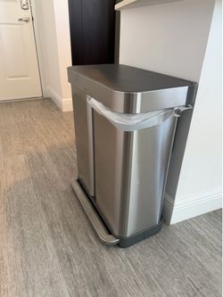 Simple human trash dual compartment