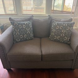 Grey Loveseat Like New must sell this weekend