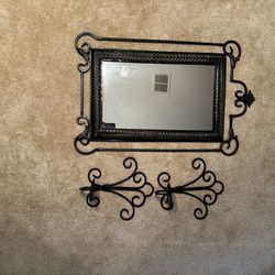 Mirror with two candle scorers