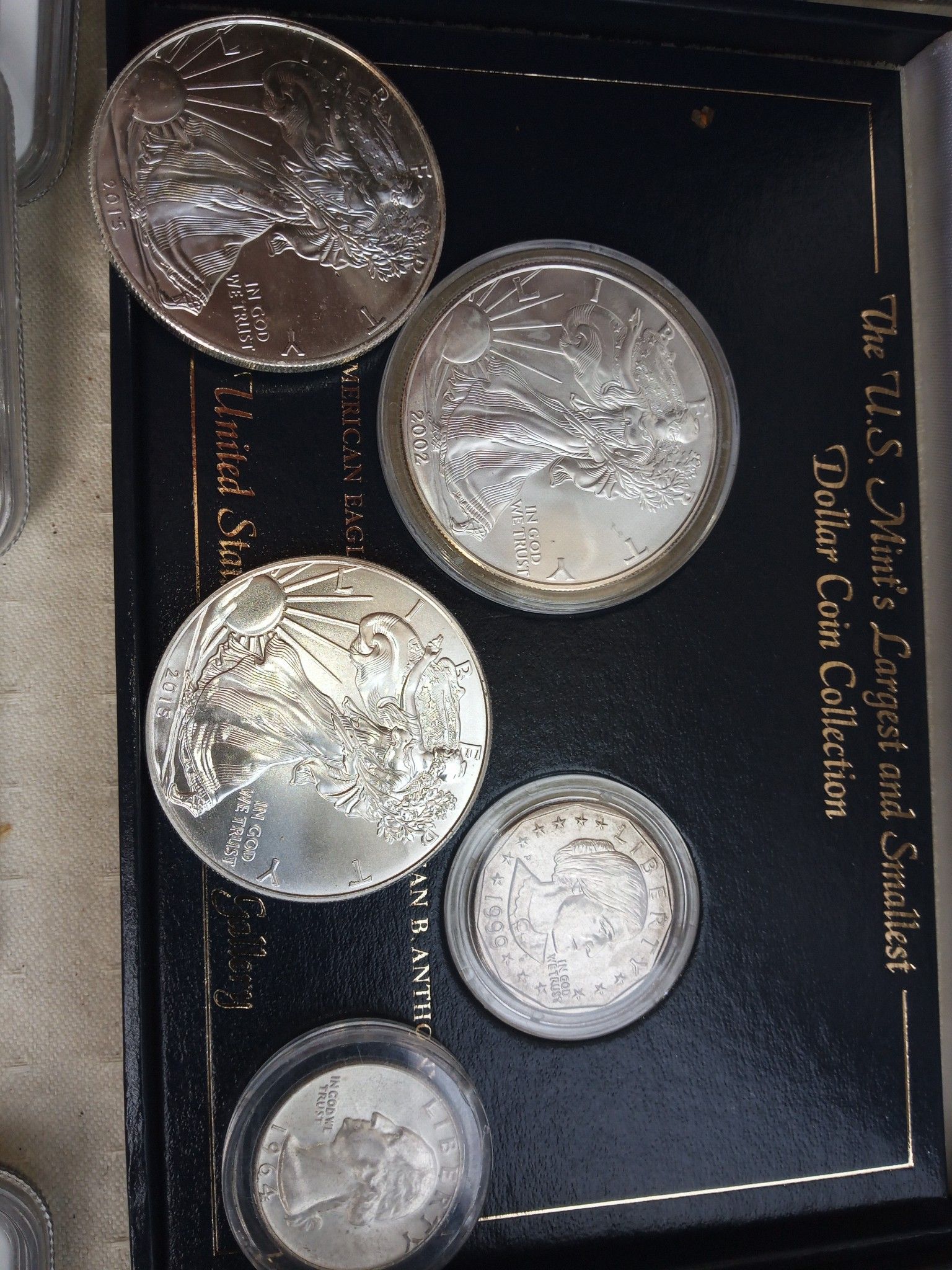 2002 and two 2015 silver walking liberty