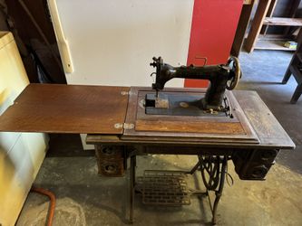 Wheeler and Wilson vintage sewing table with vintage kits. All included as is.