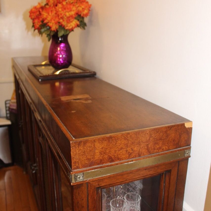 Ottoman that holds old plates and dishes or anything of your choosing