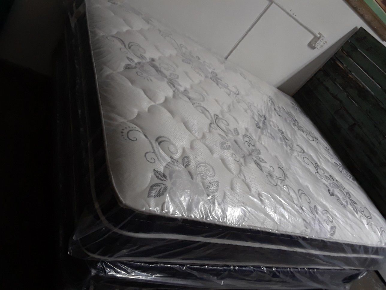 Full pillow top mattress and box spring set with 5 year warranty