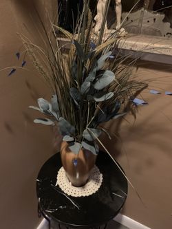 Brown wooden Vase with flowers