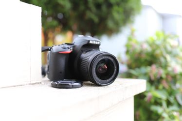 MINT Nikon D5500 with 18-55mm 3.5-5.6G lens.
