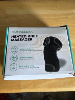 Heated knee massager