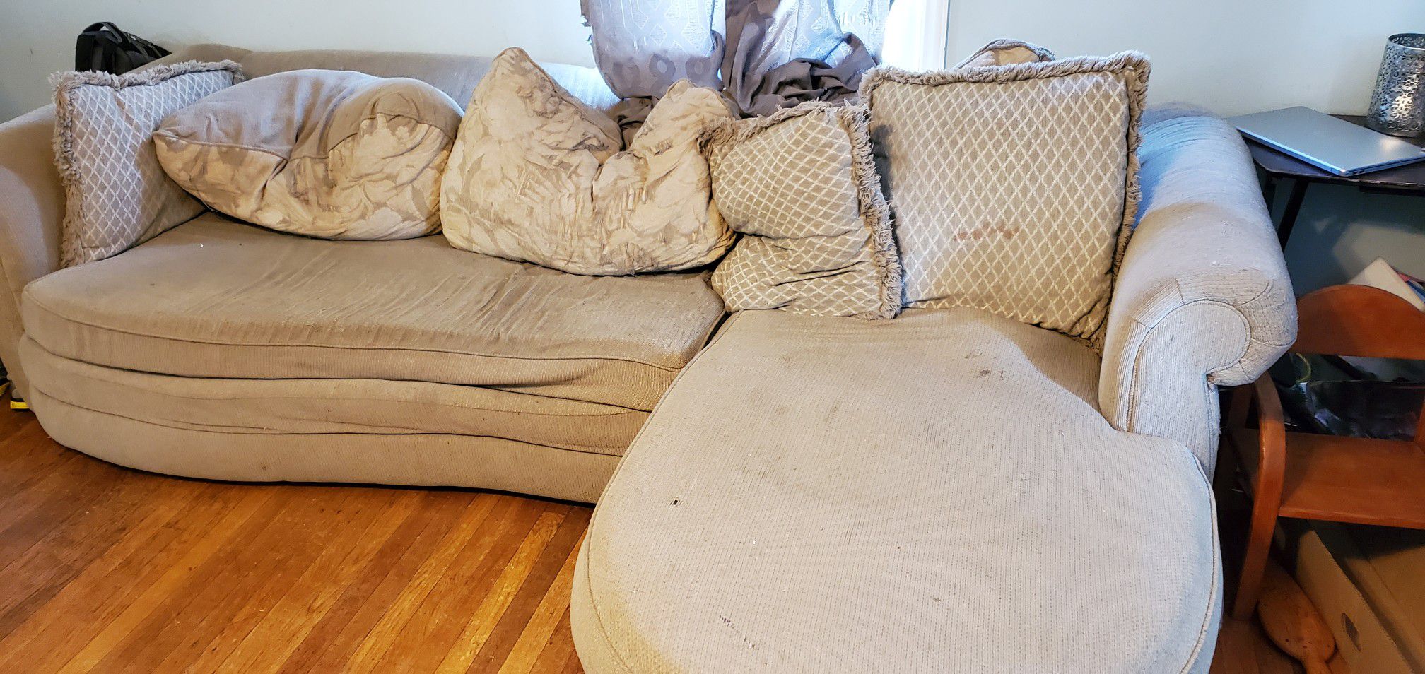 Free couch, curbside pickup.