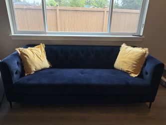 Baby blue velvet tufted power reclining sofa