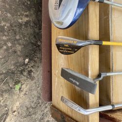 Four Golf Training Clubs