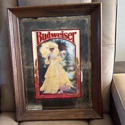 Vintage  Anheuser-Busch Budweiser mirror featuring the "Budweiser Girl" or "Lady in Yellow". 