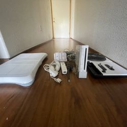 Wii With Wii Fit And DJ Hero Attachments And More Games!