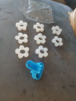 Several bags of 40 piece clear plastic balloon clips and balloon tie grips