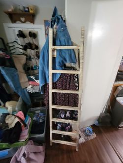 Brand new from Kirkland a white washed blanket ladder 5 ft tall roughly