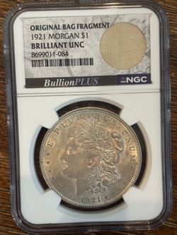 1921 Morgan Silver Dollar NGC Original Bag Fragment Brilliant UNC
