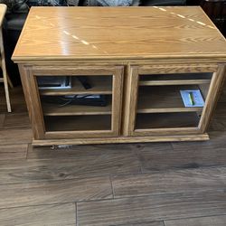 Custom oak tv cabinet plus 65 inch flatscreen Samsung tv