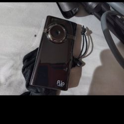 Flip Cam, Watches, Jabra bluetooth headset, & junk cables!