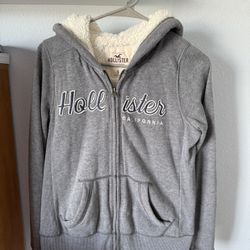 Woman Hollister Sherpa lined zip up hoodie.  Size small