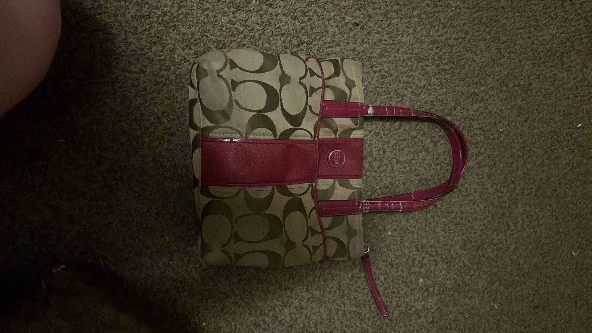 Coach Signature Monogram tote bag with purple accents