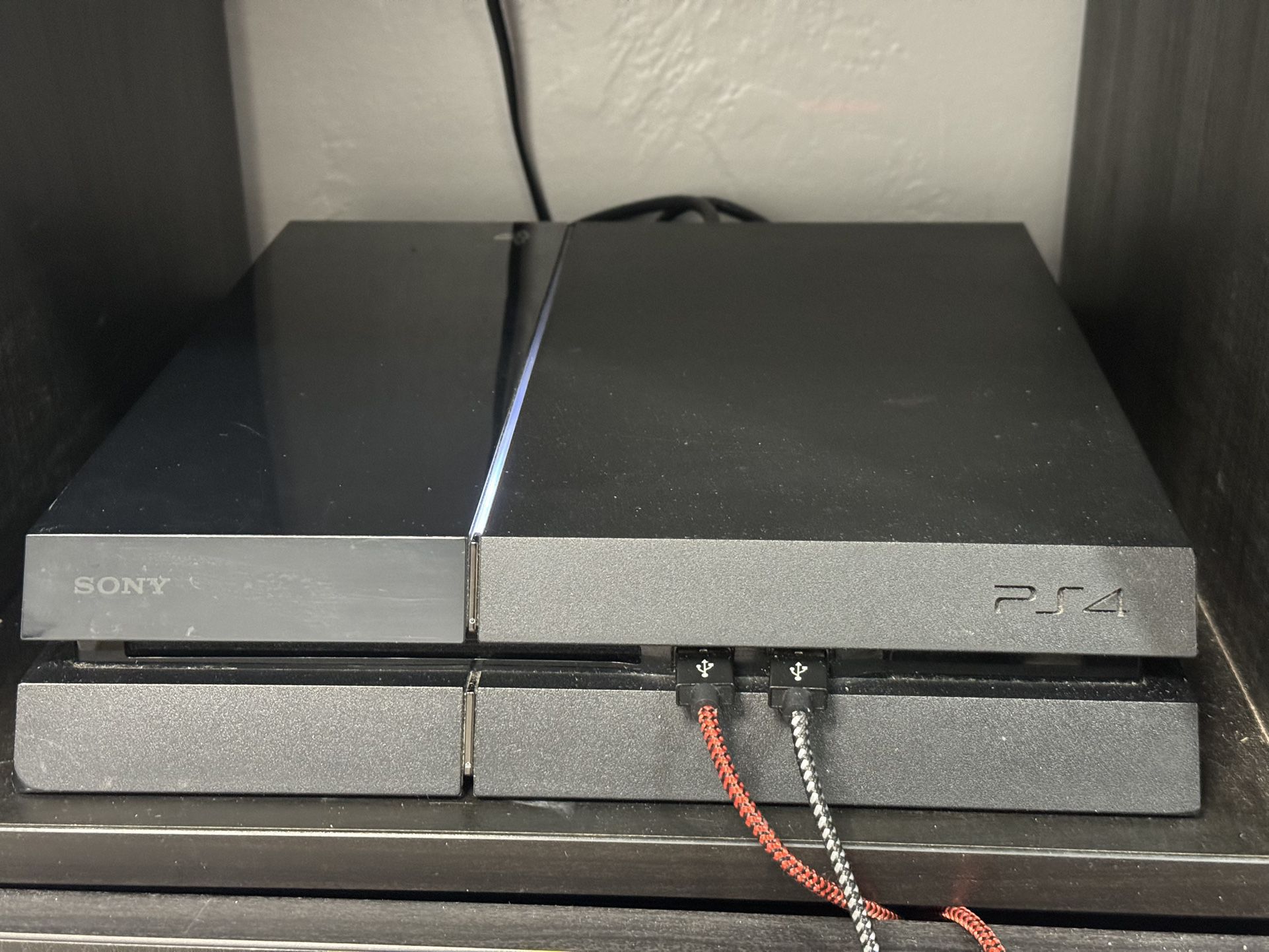PlayStation 4 for sale (games included)