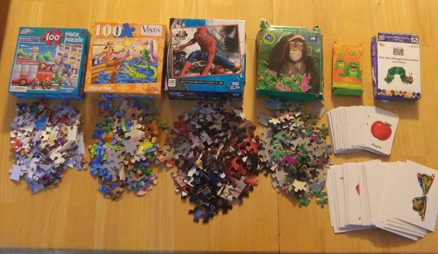 5 puzzles ( 1 not in pic) Matching Game, & Hungry Caterpillar Game