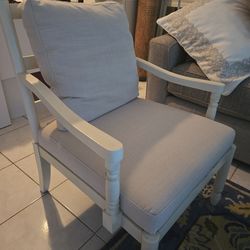 Upholstered wooden armchair