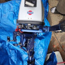 8 Hp. Nissan Outboard Motor. 