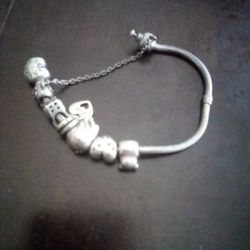 A Pandora charm Bracelet.