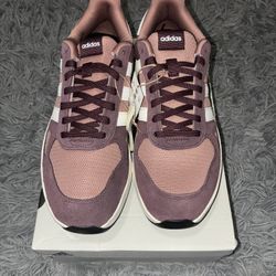 Size 11 men's brand new unworn Adidas shoes with tags and box