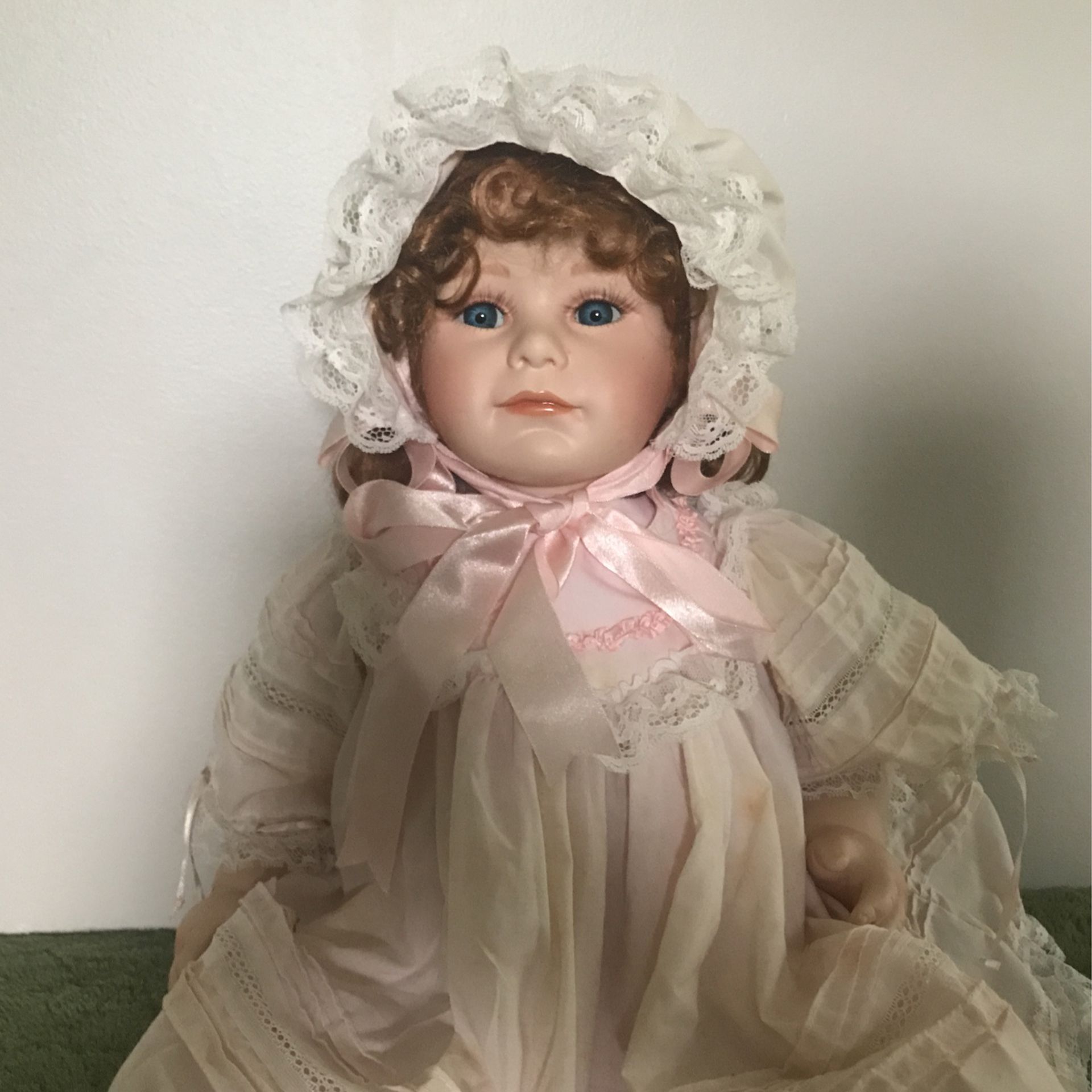 huge porcelain doll with realistic limbs