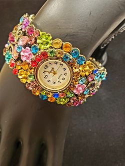 $10. Beautiful multi-colored ladies rhinestone cuff watch bracelet.