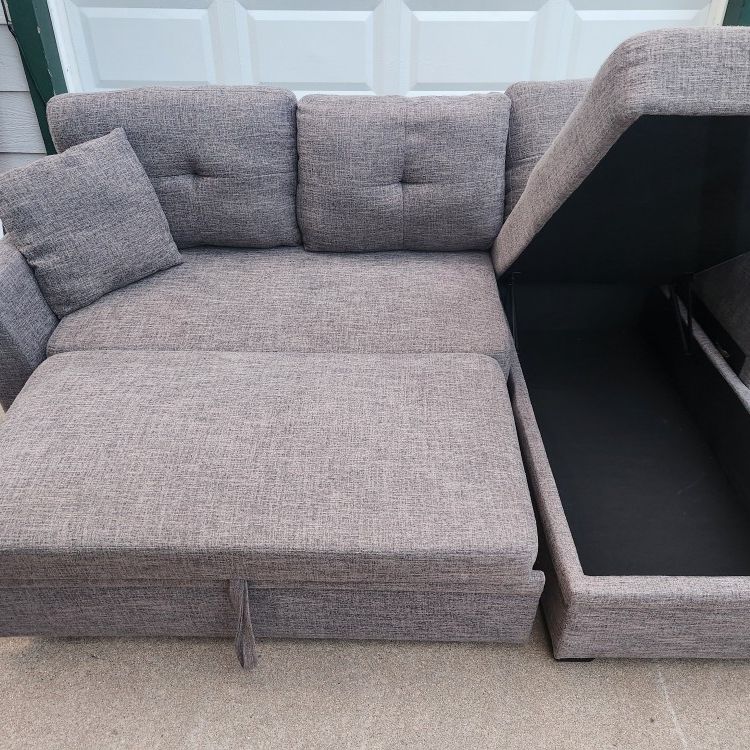 *FREE DELIVERY* Gray Sectional Couch W/ Reversible Storage Chaise And Pullout Sleeper