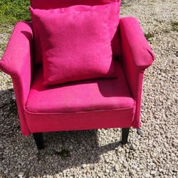 Hot pink fabric accent chair.