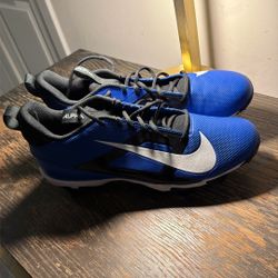 Nike Alpha training shoes in excellent condition. Blue and black colorway with white Nike swoosh. Lightweight, comfortable, and durable — perfect for 