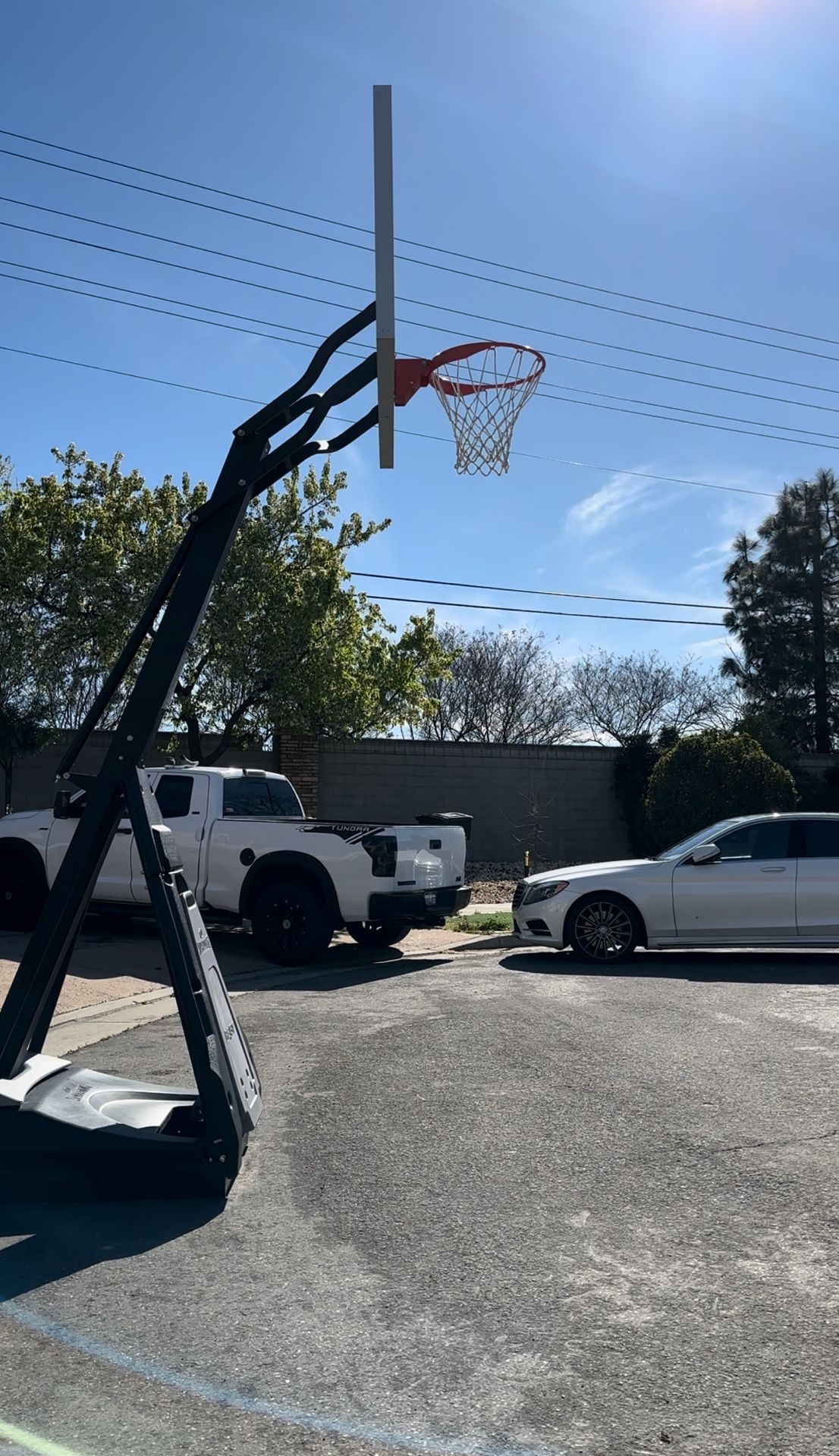 SPALDING - The Beast Portable Basketball Hoop + GOALRILLA - LED Basketball Hoop Light 
