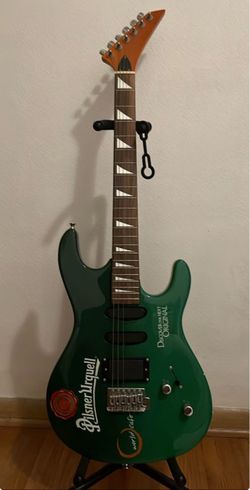 Electric guitar with stand