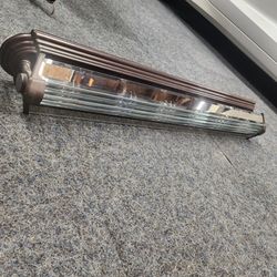 Bathroom vanity light in a bronze 48" 6 lights