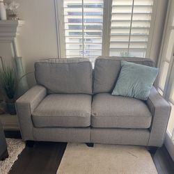 Comfy grey loveseat great condition!
