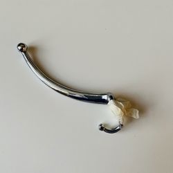 Vintage Antique Olden Wall Mount double Coat Hook. Chrome finish. Heavy duty. New. Never used. Screws are included, attached by tape.