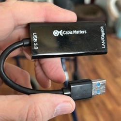 The image shows a Cable Matters USB 3.0 to Gigabit Ethernet Adapter. 
