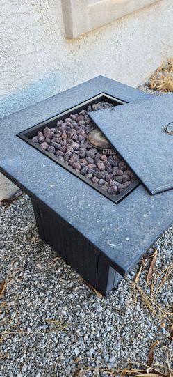 Backyard propane fireplace