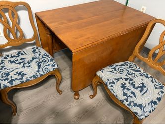 Dining room table with two chairs