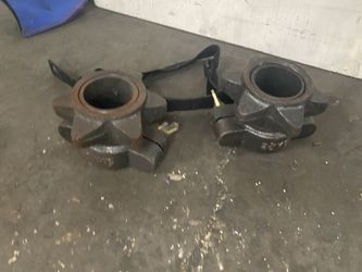 Assorted barbell clips and plate holders