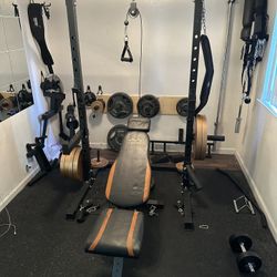 Weights With Squat Rack And Adjustable Bench. 